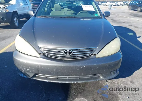2006 Toyota Camry Le z USA, uszkodzony, nr VIN 4T1BE32K16U671734